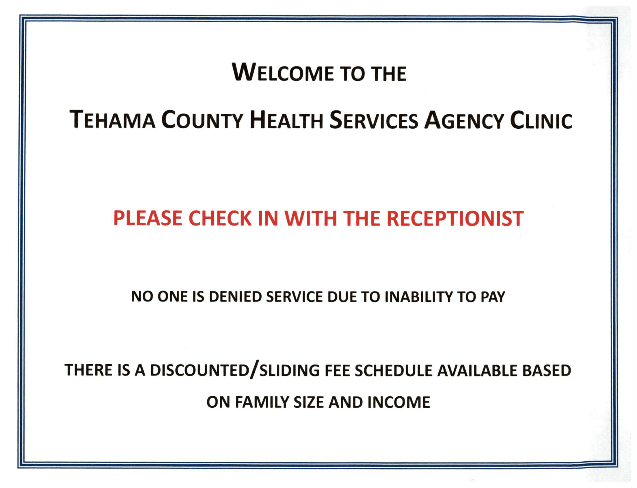 Clinic welcome sign; no one is denied services due to inability to pay